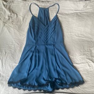 Fun and fancy romper with detailed lace bottom!